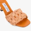 Sandali mules Chara 70 in rafia lavorata all’uncinetto arancione tramonto e pelle nappa Sandali mules Chara 70 in rafia lavorata all’uncinetto arancione tramonto e pelle nappa