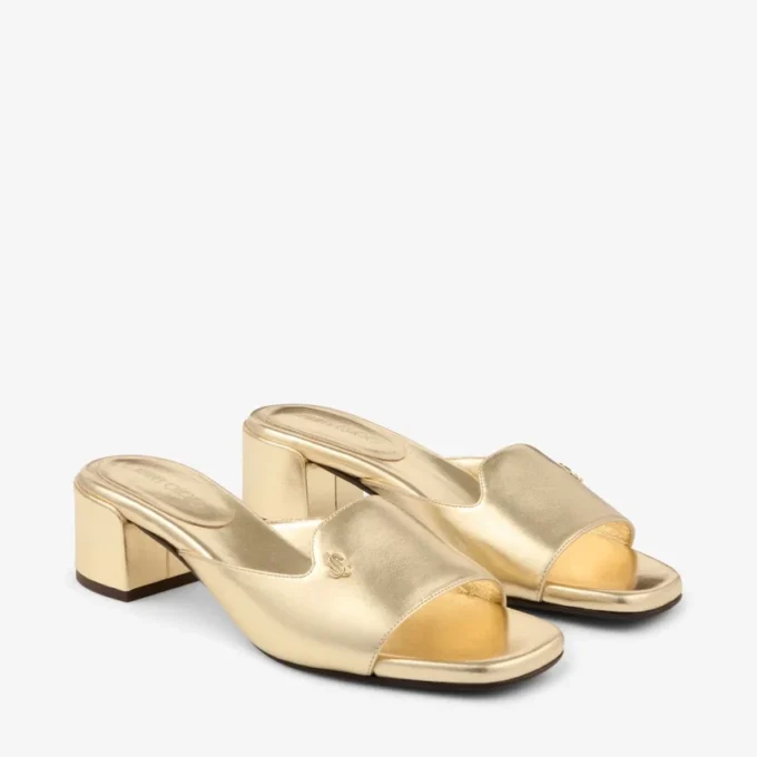 Sandali mules Dina 45 in pelle metallizzata dorata Sandali mules Dina 45 in pelle metallizzata dorata