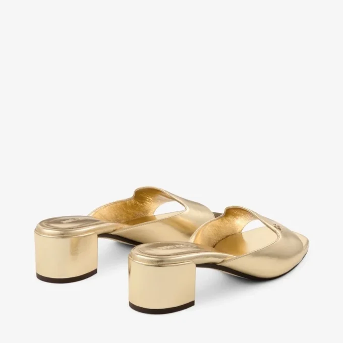 Sandali mules Dina 45 in pelle metallizzata dorata Sandali mules Dina 45 in pelle metallizzata dorata