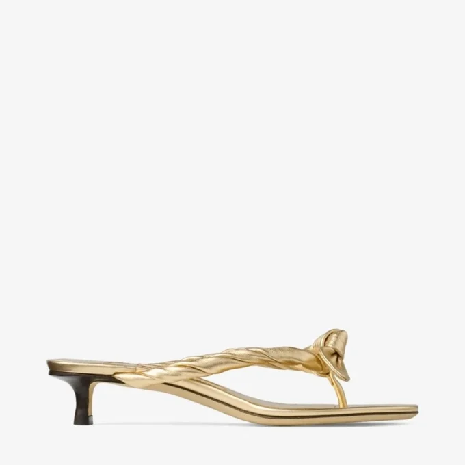 Sandali mules Liss 35 in pelle nappa metallizzata dorata con fiocco Sandali mules Liss 35 in pelle nappa metallizzata dorata con fiocco