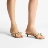 Sandali mules Liss 35 in pelle nappa metallizzata dorata con fiocco Sandali mules Liss 35 in pelle nappa metallizzata dorata con fiocco
