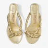 Sandali mules Liss 35 in pelle nappa metallizzata dorata con fiocco Sandali mules Liss 35 in pelle nappa metallizzata dorata con fiocco