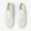 Scarpe da ginnastica basse Veles in maglia all’uncinetto color latte con perle Scarpe da ginnastica basse Veles in maglia all’uncinetto color latte con perle
