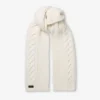 Sciarpa Yukiko a trecce color latte con etichetta in pelle con logo Sciarpa Yukiko a trecce color latte con etichetta in pelle con logo