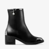 Stivaletti Adry 60 in pelle verniciata nera e nappa con ciondolo a forma di perla Stivaletti Adry 60 in pelle verniciata nera e nappa con ciondolo a forma di perla