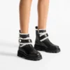 Stivaletti Meena in pelle di vitello lucida nera con shearling Stivaletti Meena in pelle di vitello lucida nera con shearling