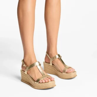 Theia Wedge 60 Sandali con zeppa in pelle metallizzata dorata