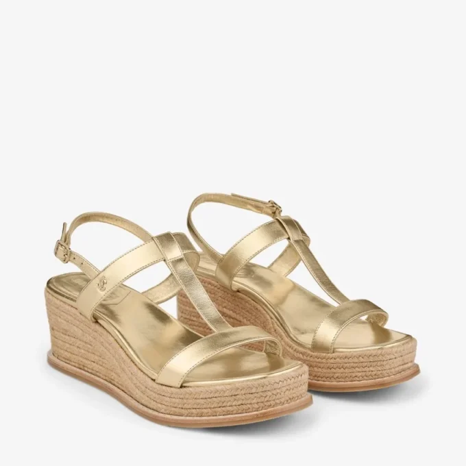 Theia Wedge 60 Sandali con zeppa in pelle metallizzata dorata Theia Wedge 60 Sandali con zeppa in pelle metallizzata dorata