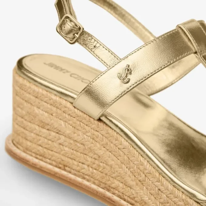 Theia Wedge 60 Sandali con zeppa in pelle metallizzata dorata Theia Wedge 60 Sandali con zeppa in pelle metallizzata dorata