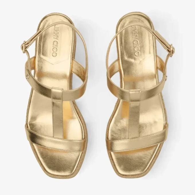 Theia Wedge 60 Sandali con zeppa in pelle metallizzata dorata Theia Wedge 60 Sandali con zeppa in pelle metallizzata dorata