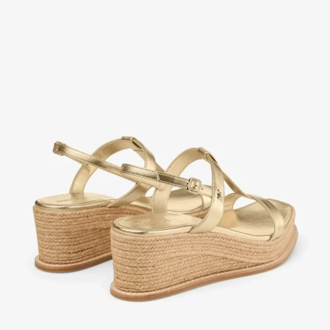 Theia Wedge 60 Sandali con zeppa in pelle metallizzata dorata Theia Wedge 60 Sandali con zeppa in pelle metallizzata dorata